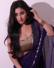 Captivating Actress Kheyali Nath in a Blue Embellished Saree with Gold Blouse Photos 05