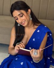 Charming Kheyali Nath Cleavage in a Blue Heart Print Saree Photos 01