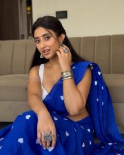 Charming Kheyali Nath Cleavage in a Blue Heart Print Saree Photos 03