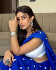Charming Kheyali Nath Cleavage in a Blue Heart Print Saree Photos 04