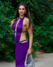 Daring Manmeet Kaur Virk Cleavage in a Purple Halterneck Deep V Cutout Draped Dress Photos 02