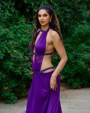 Daring Manmeet Kaur Virk Cleavage in a Purple Halterneck Deep V Cutout Draped Dress Photos 05