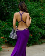 Daring Manmeet Kaur Virk Cleavage in a Purple Halterneck Deep V Cutout Draped Dress Photos 07