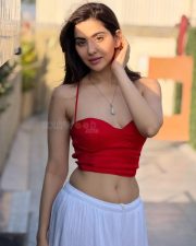 Dazzling Actress Hritiqa Chheber in a Red Spaghetti Strap Crop Top And White Palazzo Pants Photos 10