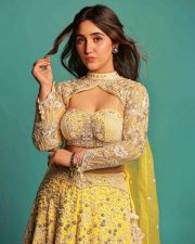 Sparkling Actress Ashnoor Kaur in a Yellow Lehenga Photos 01
