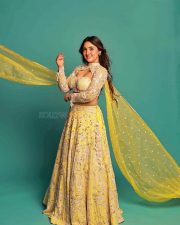 Sparkling Actress Ashnoor Kaur in a Yellow Lehenga Photos 02