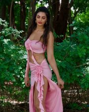 Stunning Actress Manmeet Kaur Virk in a Pink Strapless Bandeau High Slit Ruffle Skirt Photos 05