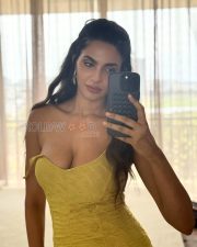 Sultry Manmeet Kaur Cleavage in a Yellow Off Shoulder Bodycon Dress Photos 01