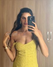 Sultry Manmeet Kaur Cleavage in a Yellow Off Shoulder Bodycon Dress Photos 02