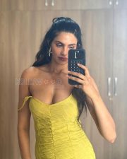 Sultry Manmeet Kaur Cleavage in a Yellow Off Shoulder Bodycon Dress Photos 03