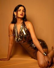 Enchanting Shubhi Joshi in a Metallic Gold Bodycon Mini Dress Photos 03