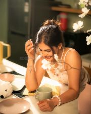 Endearing Actress Shruti Prakash in a White Lace Corset Top And White Shorts Photos 04
