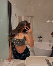 Glamorous Actress Jasmin Walia in a Teal Embellished Saree with Jeweled Bandeau Blouse Photos 06