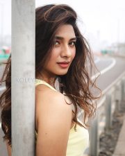 Charming Actress Natasha Bharadwaj in a Yellow Tank Top Photos 01