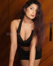 Daring Shanu Dhekawa Cleavage in a Black Halter Top and Mini Skirt Photos 01