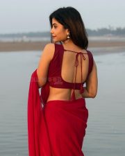 Enchanting Actress Rosyy Satpathyy in a Red Drape Outfit Photos 01