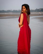 Enchanting Actress Rosyy Satpathyy in a Red Drape Outfit Photos 07