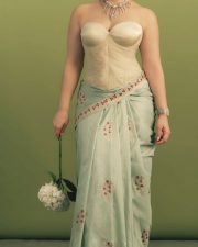 Enchanting Actress Sara Tendulkar in a Mint Floral Corset Saree Photos 01