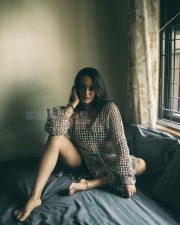 Enigmatic Apoorva Arora Legs in a Beige Crochet Mesh Knit Sweater Photos 04
