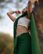 Graceful Actress Rosyy Satpathyy in a Green Saree White Blouse Photos 04