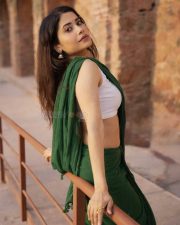 Graceful Actress Rosyy Satpathyy in a Green Saree White Blouse Photos 05