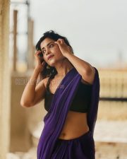 Graceful Actress Rosyy Satpathyy in a Purple Saree Black Blouse Photos 02