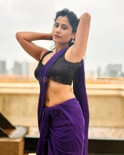 Graceful Actress Rosyy Satpathyy in a Purple Saree Black Blouse Photos 03