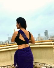 Graceful Actress Rosyy Satpathyy in a Purple Saree Black Blouse Photos 04