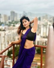 Graceful Actress Rosyy Satpathyy in a Purple Saree Black Blouse Photos 05