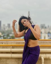 Graceful Actress Rosyy Satpathyy in a Purple Saree Black Blouse Photos 06