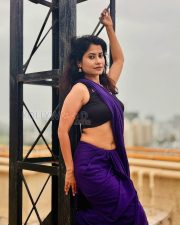 Graceful Actress Rosyy Satpathyy in a Purple Saree Black Blouse Photos 07