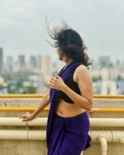 Graceful Actress Rosyy Satpathyy in a Purple Saree Black Blouse Photos 08