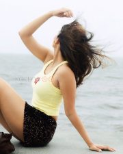 Radiant Actress Natasha Bharadwaj in a Yellow Crop Top and Sequin Shorts Photos 07
