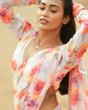 Sevappi Actress Poornima Ravi in a Pink Floral Saree Pictures 01