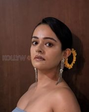 Sexy Apoorva Arora in a Strapless Off Shoulder Blue Ruffle Trim Bodycon Dress Photos 01