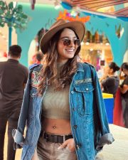 Sexy Natasha Bharadwaj Showing Pierced Navel in a Crop Top and Denim Jacket Photos 01