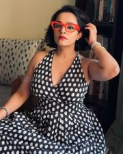 Winsome Actress Apoorva Arora in a Black And White Polka Dot Halter Wrap Dress Photos 01