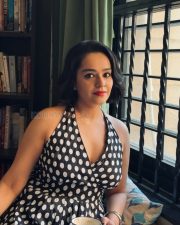 Winsome Actress Apoorva Arora in a Black And White Polka Dot Halter Wrap Dress Photos 02