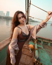 Enchanting Actress Muna Gauchan in a dusty rose embroidered crop choli with draped pallu and flower accent photos 04 Enchanting Actress Muna Gauchan in a dusty rose embroidered crop choli with draped pallu and flower accent photos 04