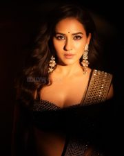 Glam Neeti Mohan in a Sequinned Black Saree Photos 05