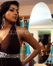 Glamorous Actress Malavika in a Brown Halter Neck Gown Photos 32